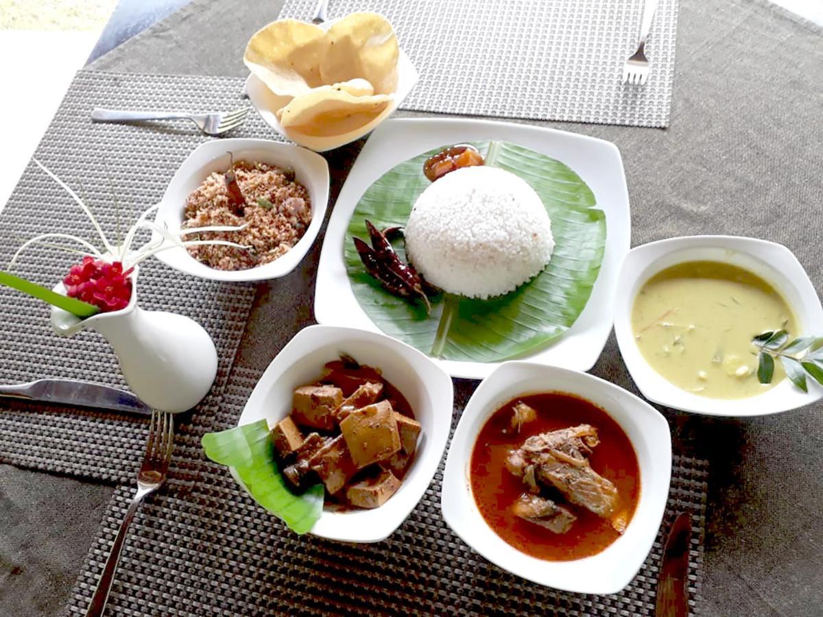 Dream Garden Hotel อารูกัมเบย์ ภายนอก รูปภาพ